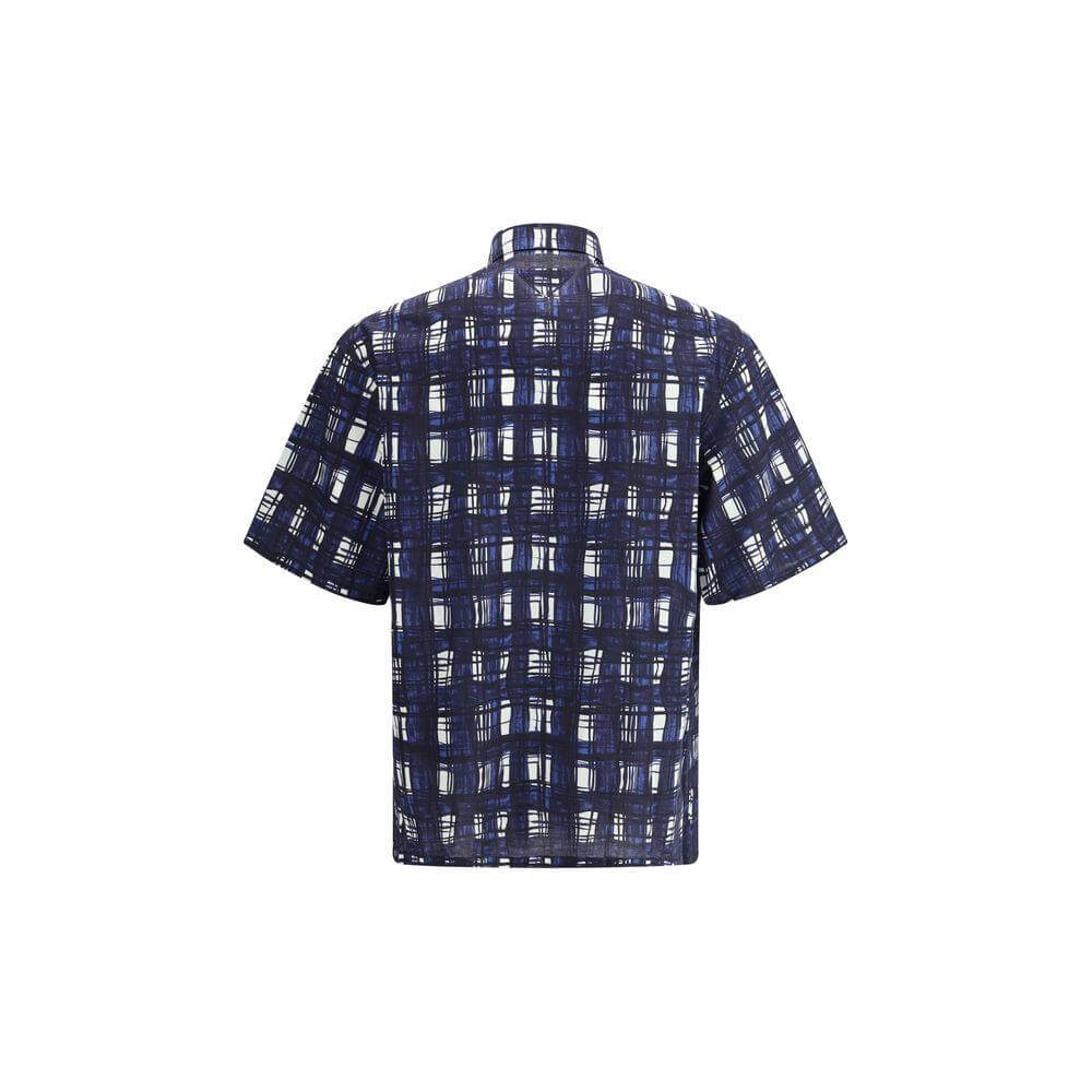 Back view of Prada Madras check pattern short-sleeved cotton shirt showcasing elegant design ideal for warm seasons.