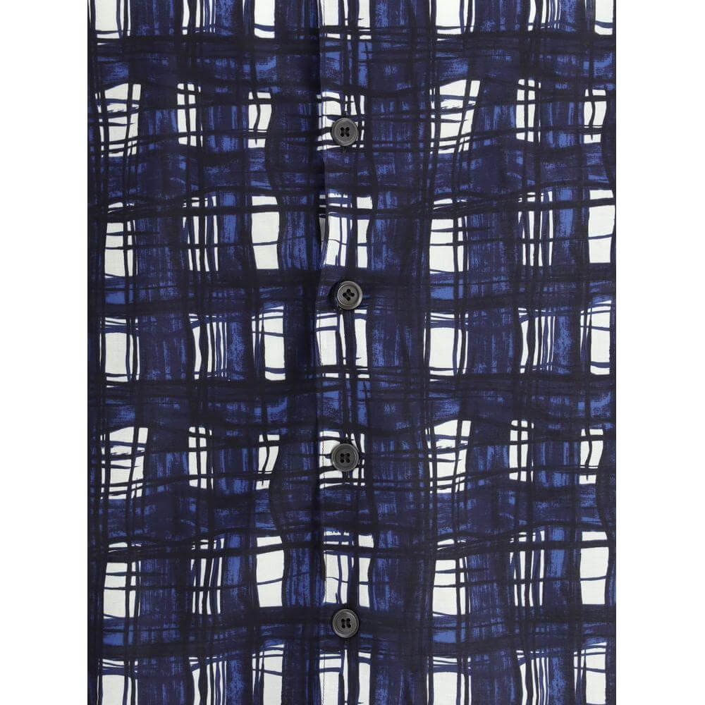 Prada Madras check pattern cotton shirt with front button closure, featuring a sophisticated blue and white plaid design.