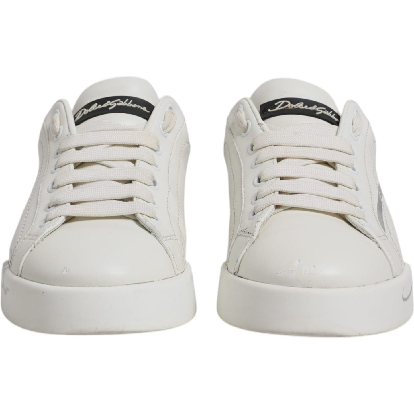 Dolce & Gabbana Portofino men's sneakers in white and black leather with lace-up front and logo, rubber soles, casual style.