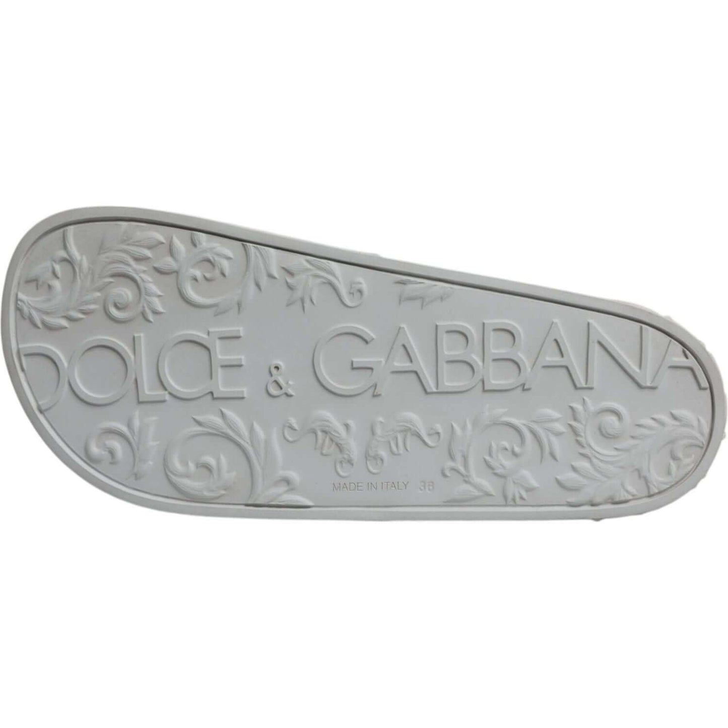 Dolce & Gabbana white rubber sole with embossed floral design, logo detail, "Made in Italy" marking on slide sandals, beachwear shoes.