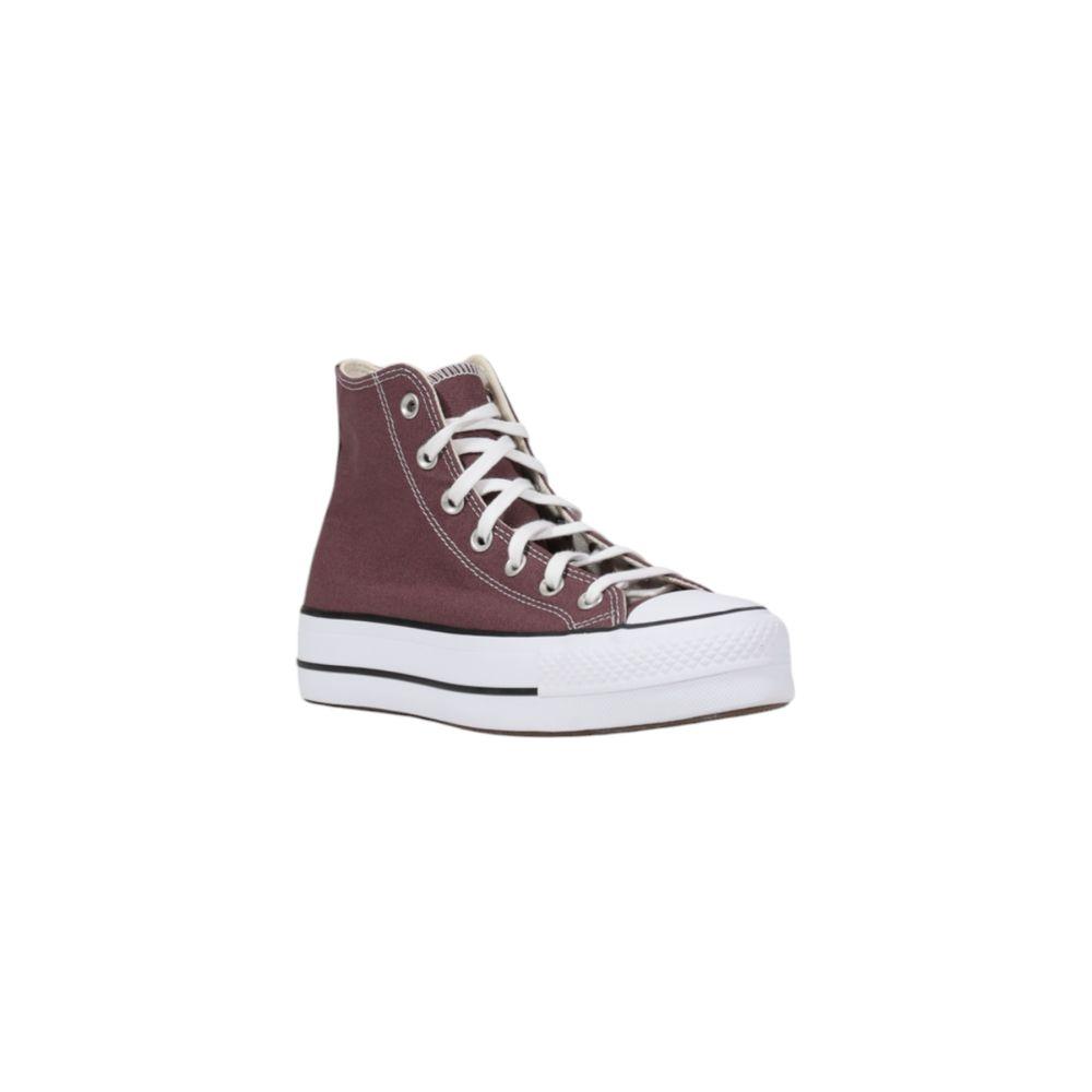 Converse purple fabric sneaker with lifted sole, ideal for casual style and comfort, featuring iconic design and women’s fit.