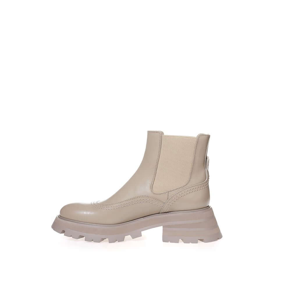 Alexander McQueen chic gray leather boots with modern silhouette for elegant steps.