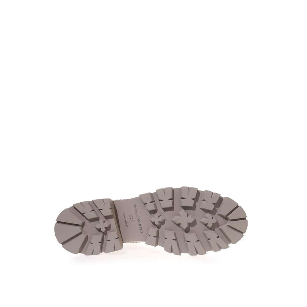 Sole view of Alexander McQueen chic gray leather boots showcasing durable craftsmanship and elegant style.