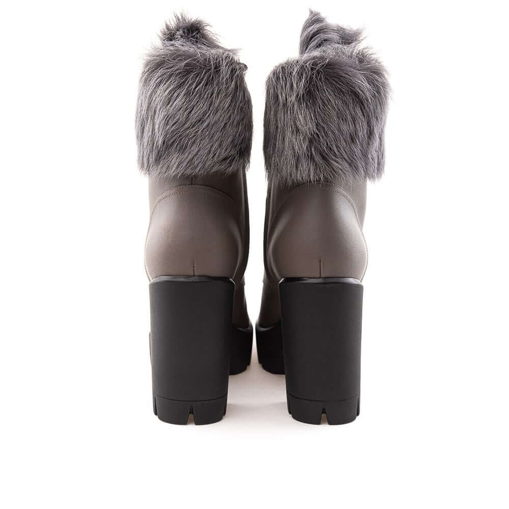 Giuseppe Zanotti gray eco leather boots with faux fur trim, black notched soles, and lace-up design. Fashion forward winter footwear.