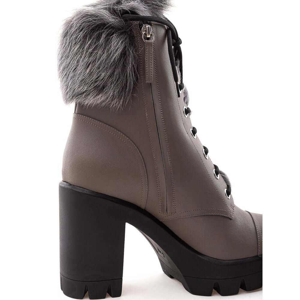 Giuseppe Zanotti gray eco leather combat boot with inner faux fur, black notched sole, lace-up front, and side zipper.