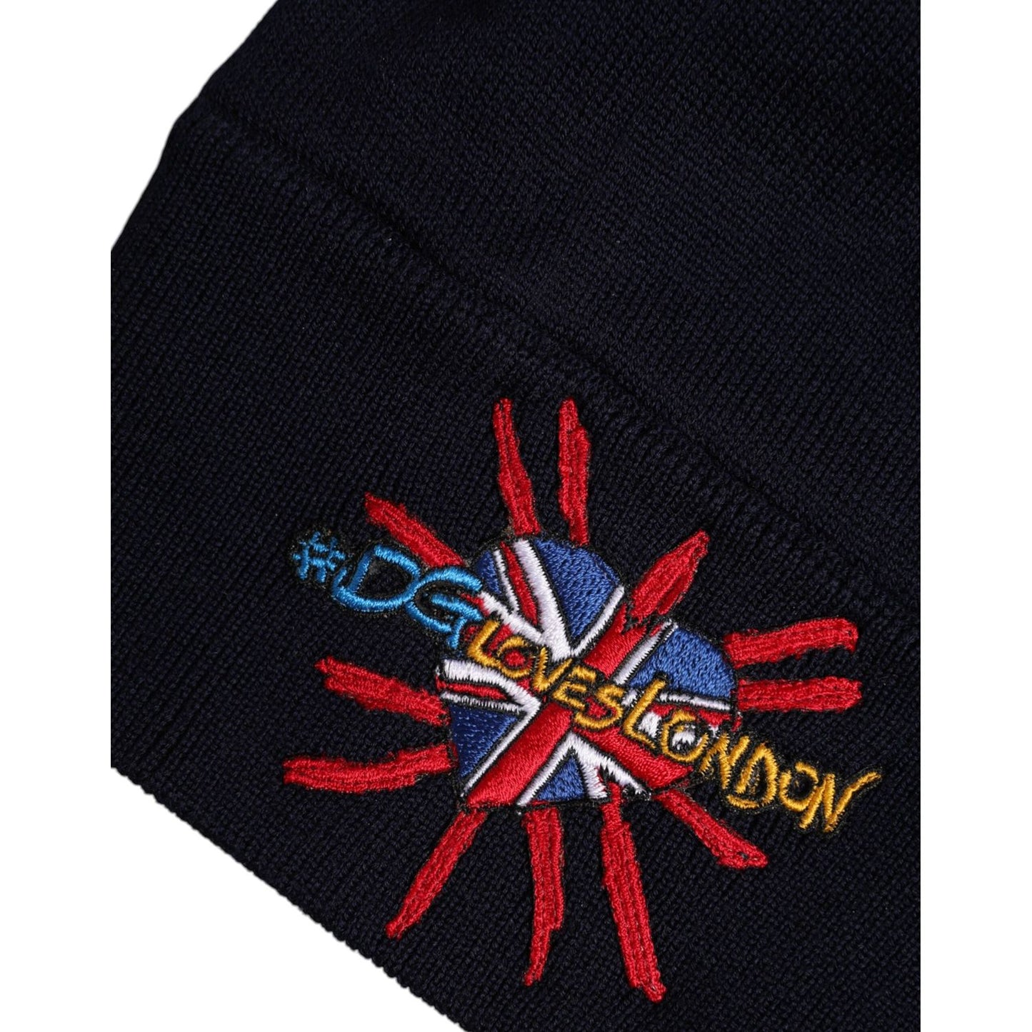 Dolce & Gabbana black wool beanie with #DGLovesLondon Union Jack embroidery, showcasing stylish winter fashion. Made in Italy.