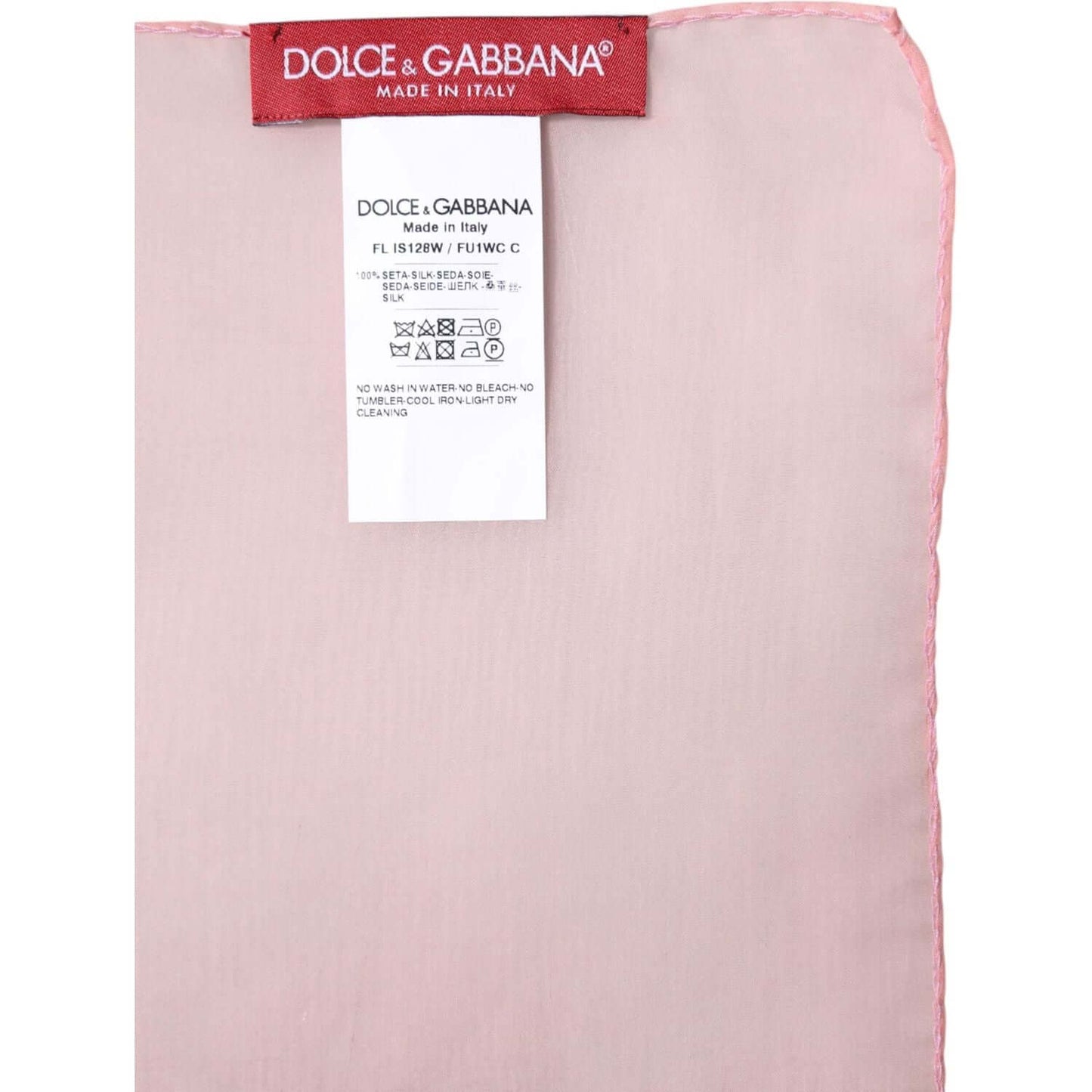 Dolce & Gabbana pink silk wrap shawl scarf with label showing logo and care instructions, made in Italy.