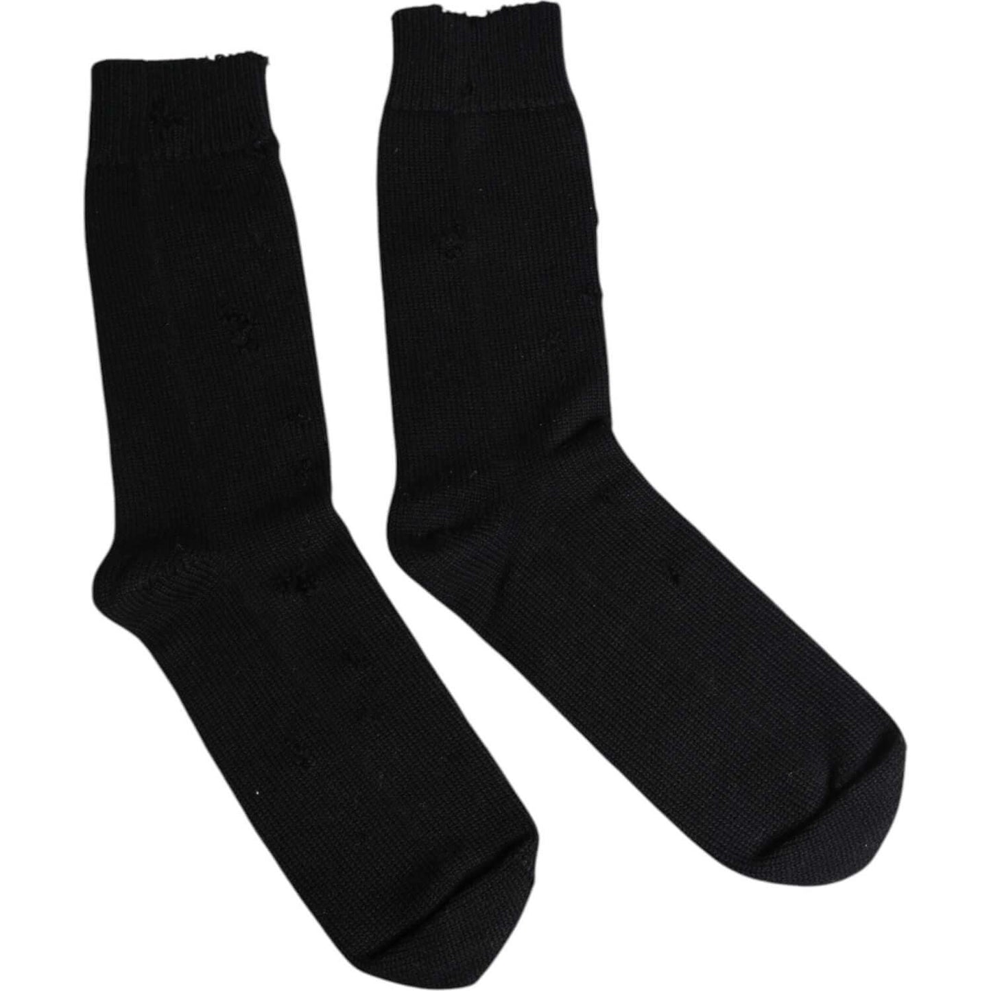 Dolce & Gabbana black mid calf men's socks with logo, made in Italy, featuring stretch fabric and minor holes as defects.