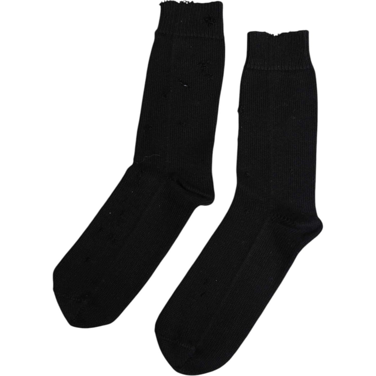 Dolce & Gabbana men's black mid-calf socks, solid stretch with logo, minor defects visible, made in Italy.