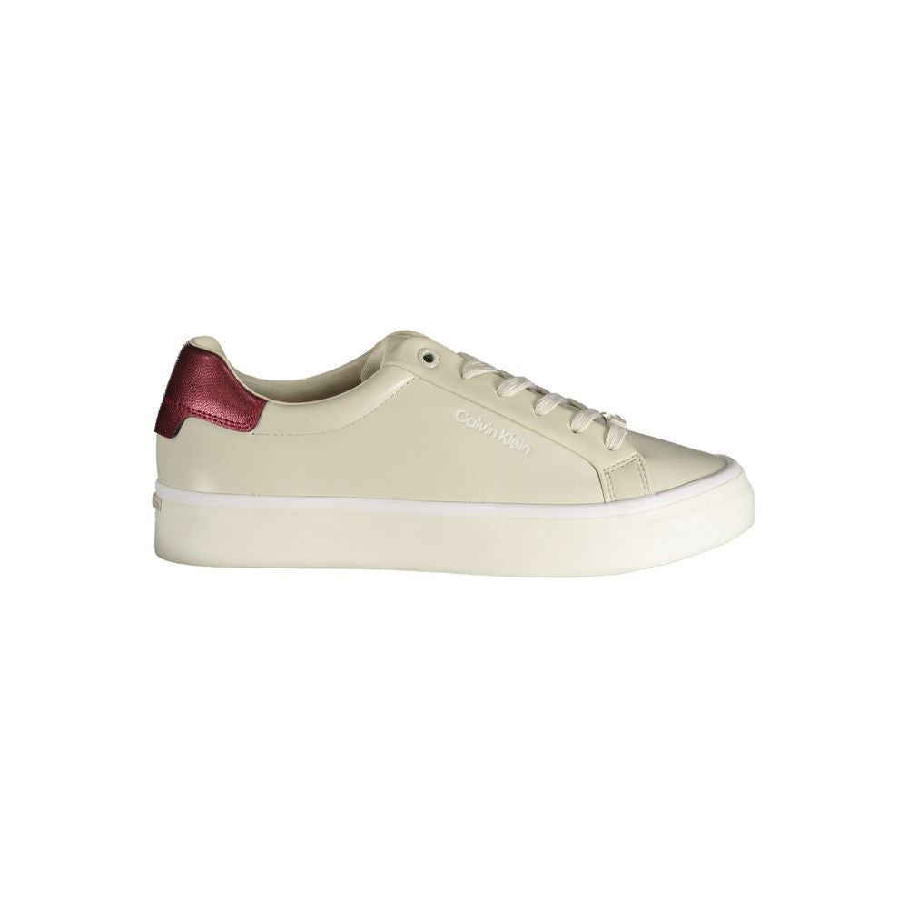 Calvin Klein beige polyester sneaker with contrast detail, logo print, and laces. Stylish sports footwear ideal for casual wear.
