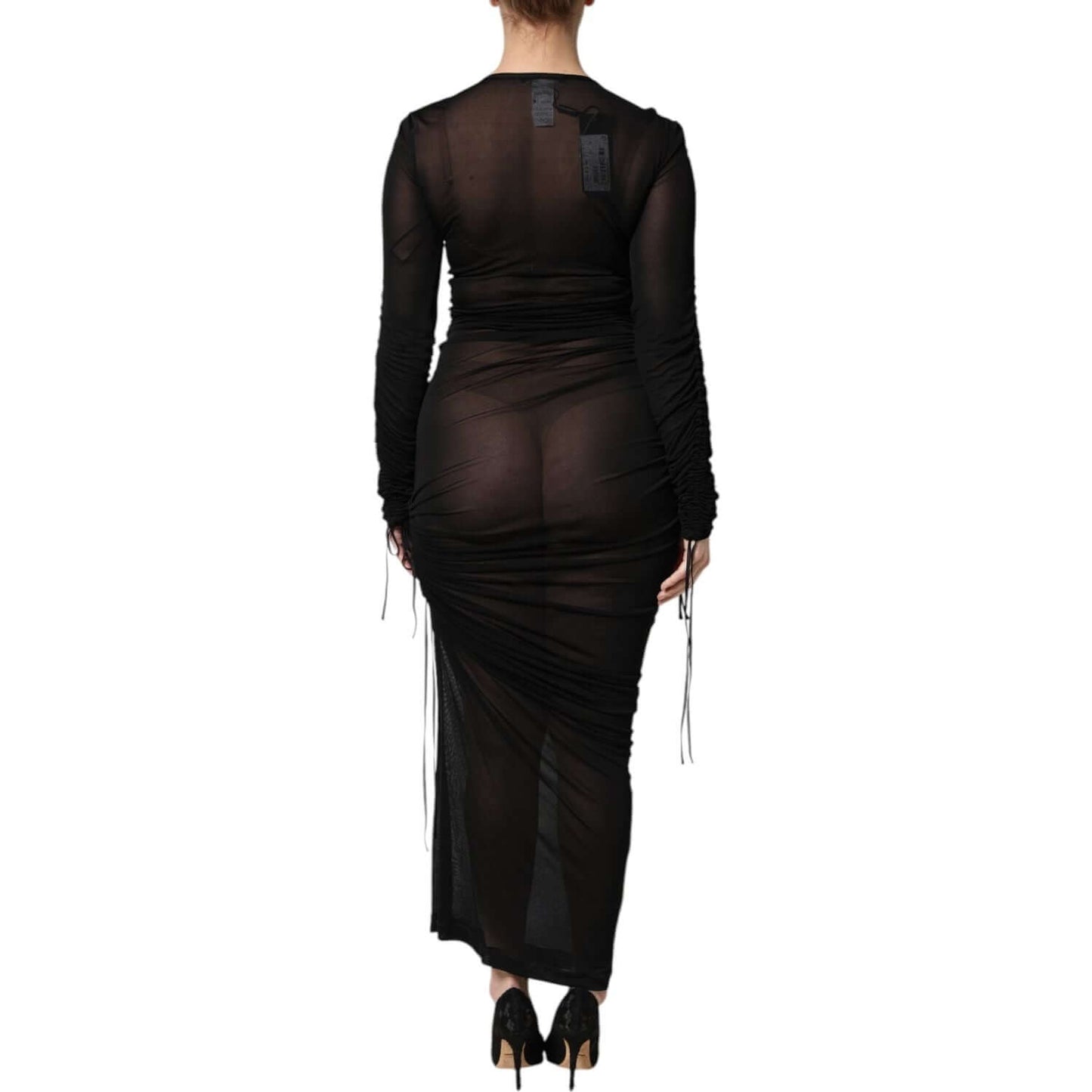 Back view of Dolce & Gabbana black mesh trim bodycon long sheath dress with long sleeves, worn by model. Luxurious Italian craftsmanship.