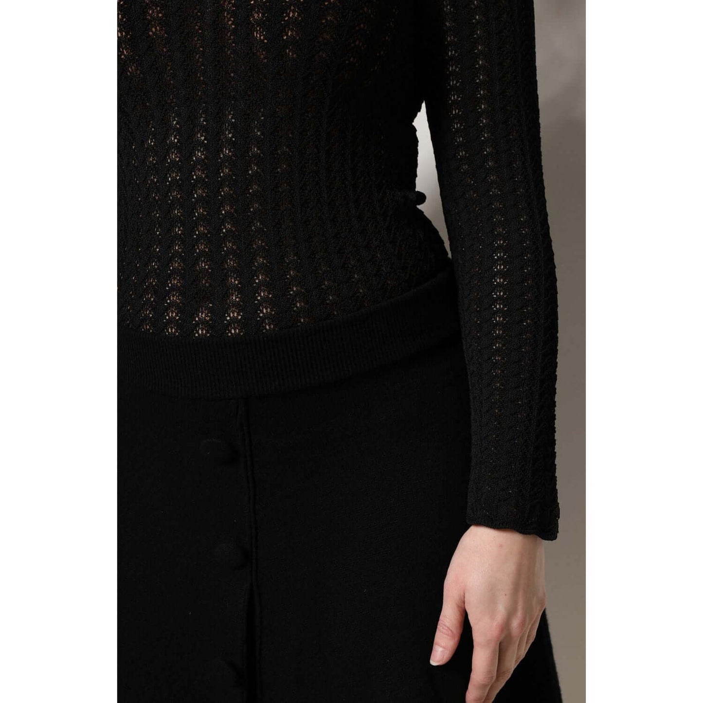 Dolce & Gabbana black cashmere long sleeve A-line midi dress detail, featuring high craftsmanship design and exclusive style.