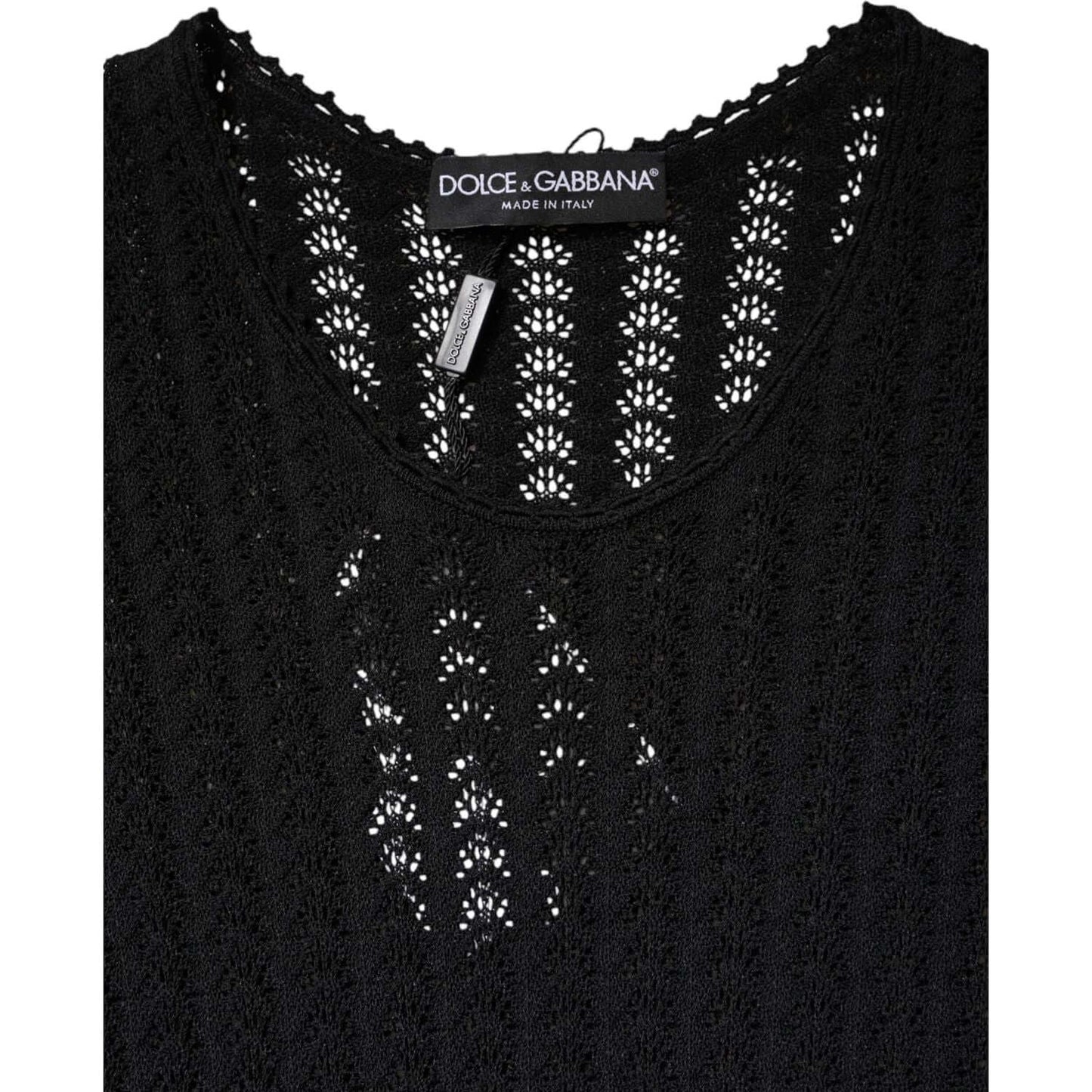 Dolce & Gabbana black cashmere midi dress with intricate pattern, brand tag visible, made in Italy.