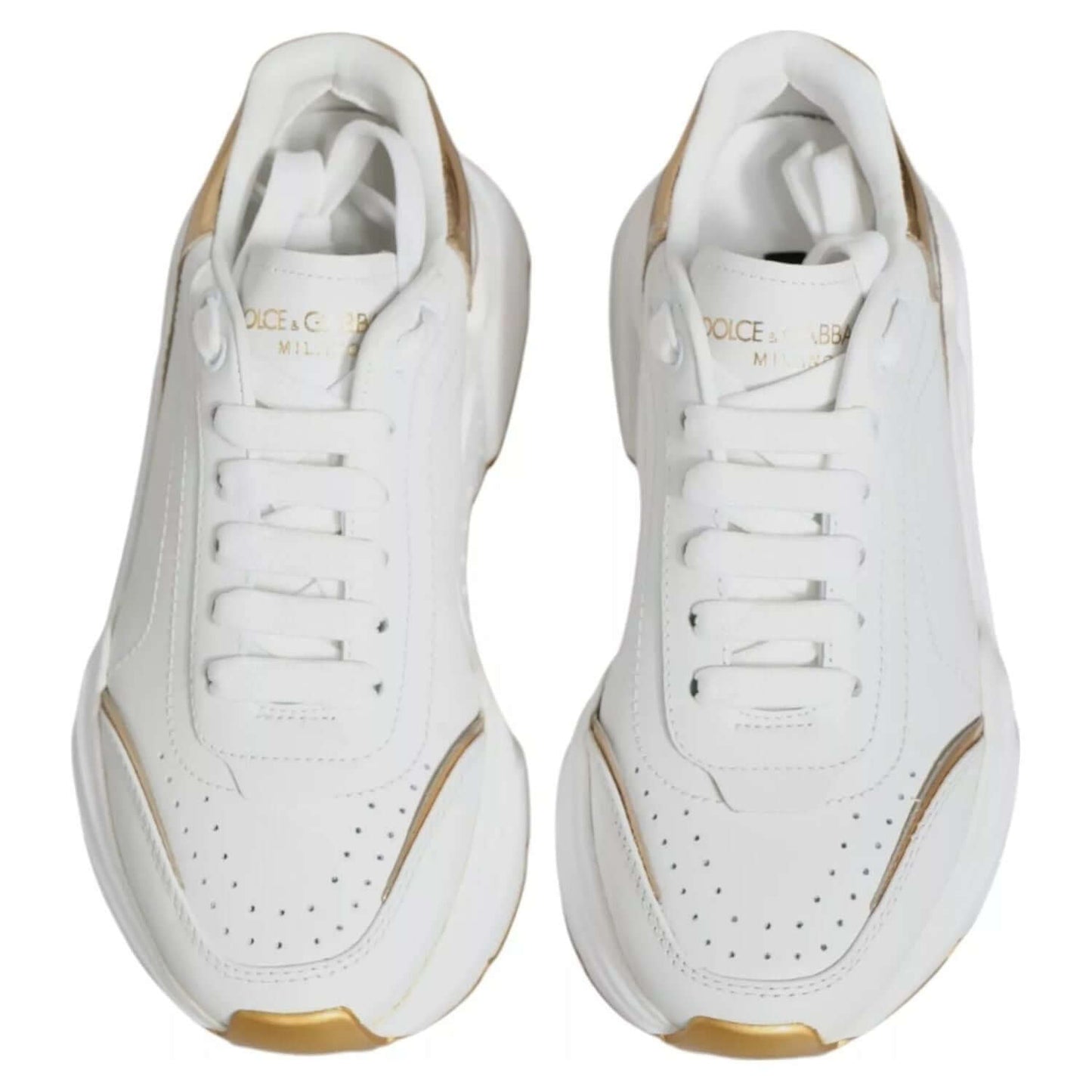 Dolce & Gabbana White Gold Daymaster Low Top Sneakers made of leather with rubber sole, lace-up closure, and logo details.