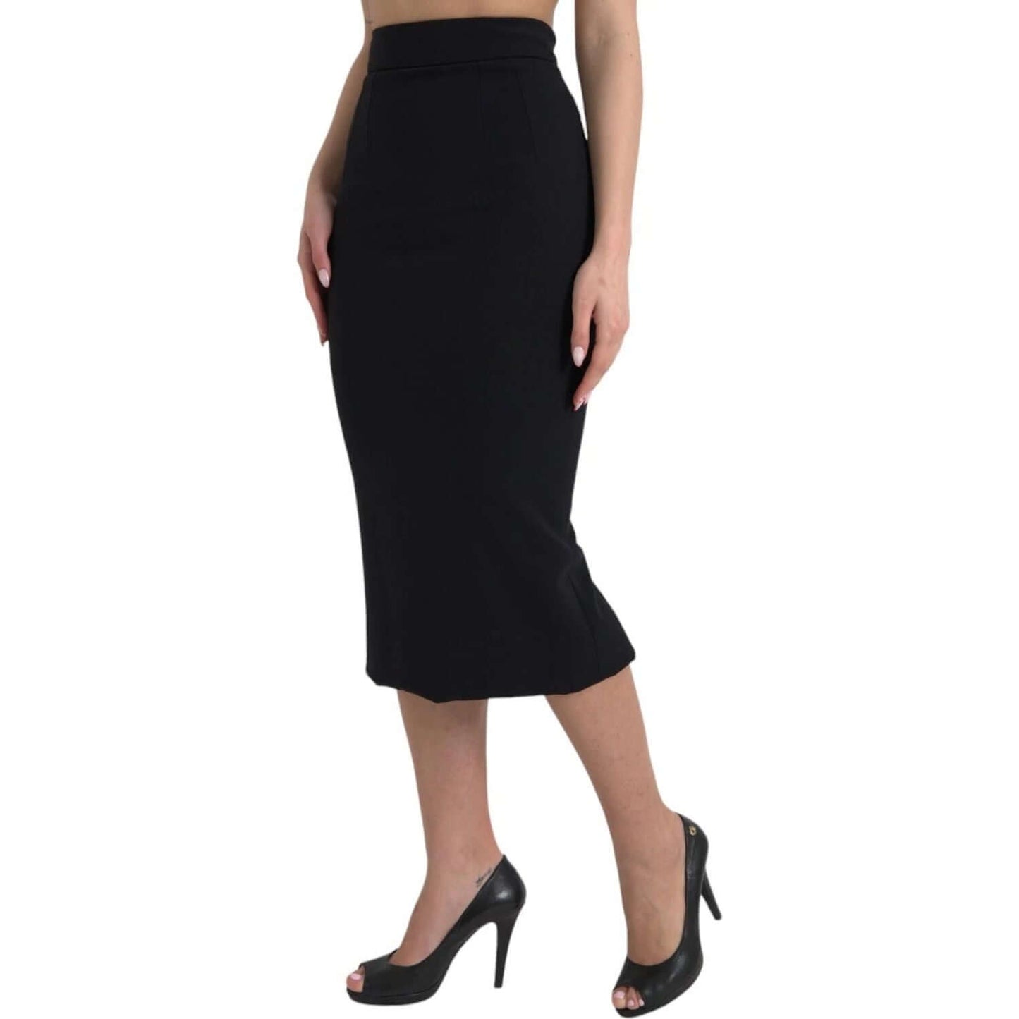 Dolce & Gabbana black wool high waist pencil cut midi skirt with a model wearing black heels, showcasing a chic party outfit.