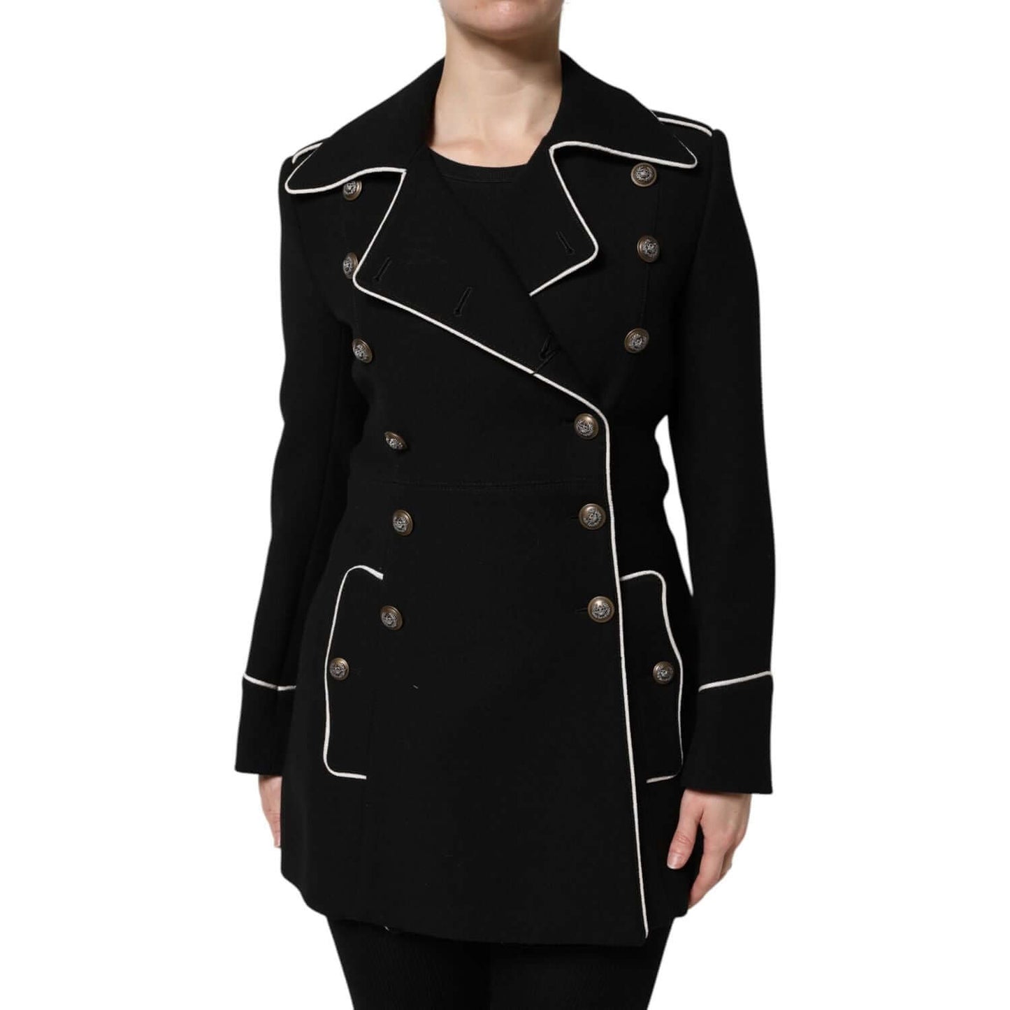 Dolce & Gabbana black double breasted wool blazer with button closure, long sleeves, and white piping details. Made in Italy.