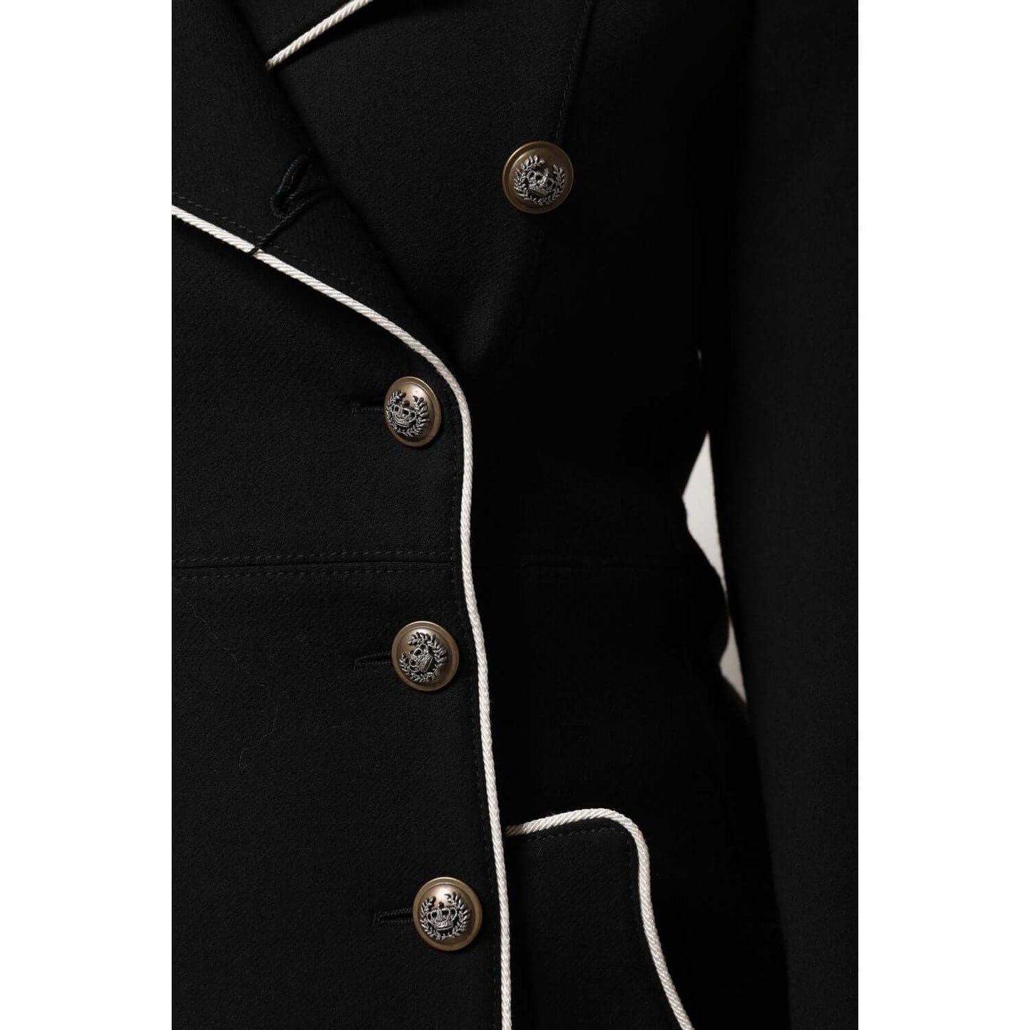 Dolce & Gabbana black wool double breasted blazer with decorative buttons and white piping detail.