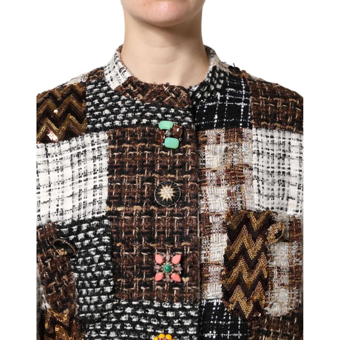Dolce & Gabbana multicolor patchwork button down jacket, featuring intricate fabrics and button details, showcasing luxury fashion craftsmanship.