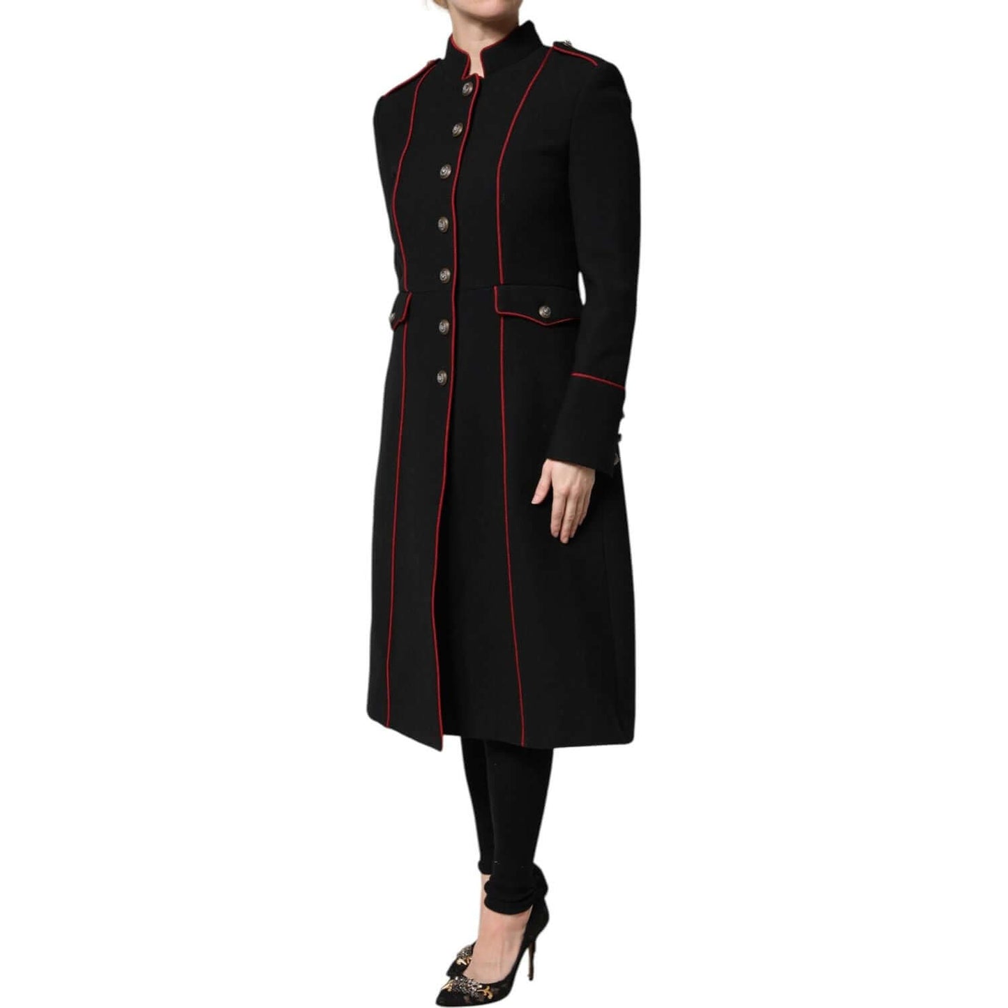 Dolce & Gabbana black wool single breasted trench coat with red piping, timeless design, elegant button closure, worn by model.