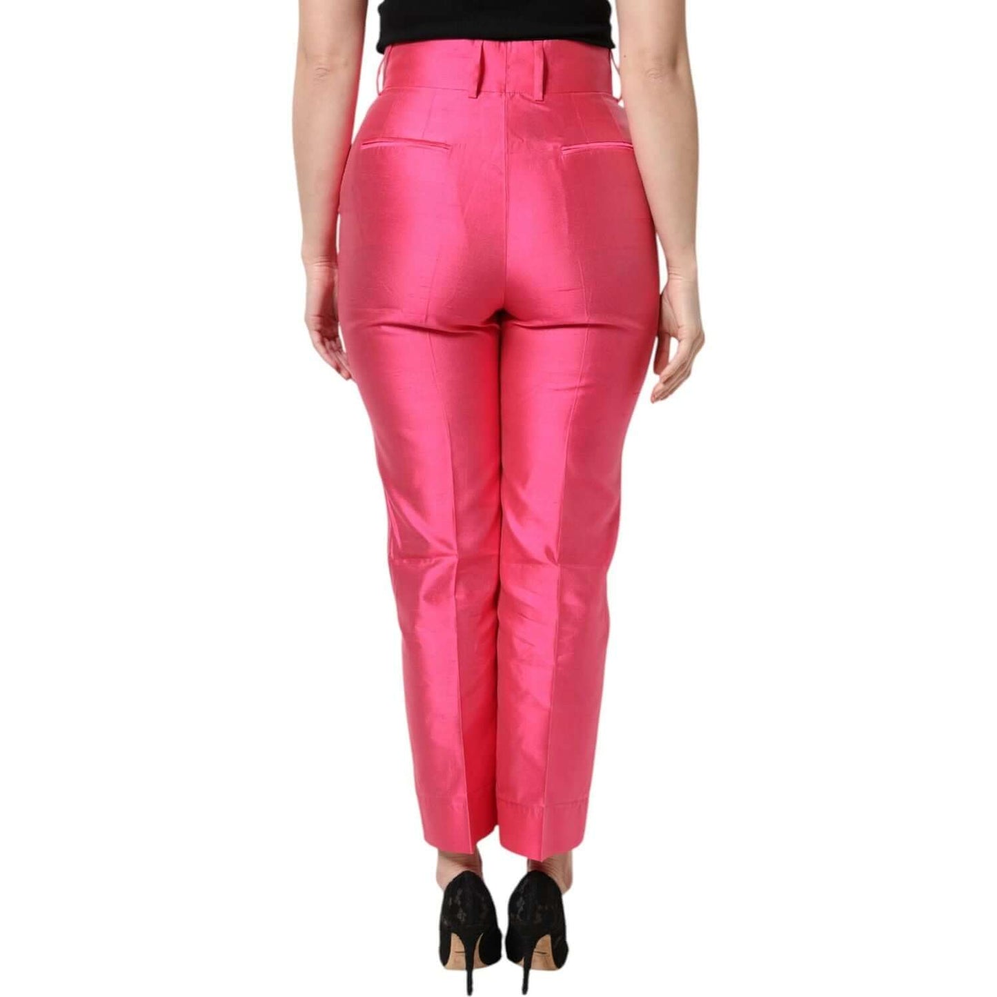 Back view of Dolce & Gabbana pink silk high waist tapered pants showcasing luxury Italian craftsmanship and elegant design.