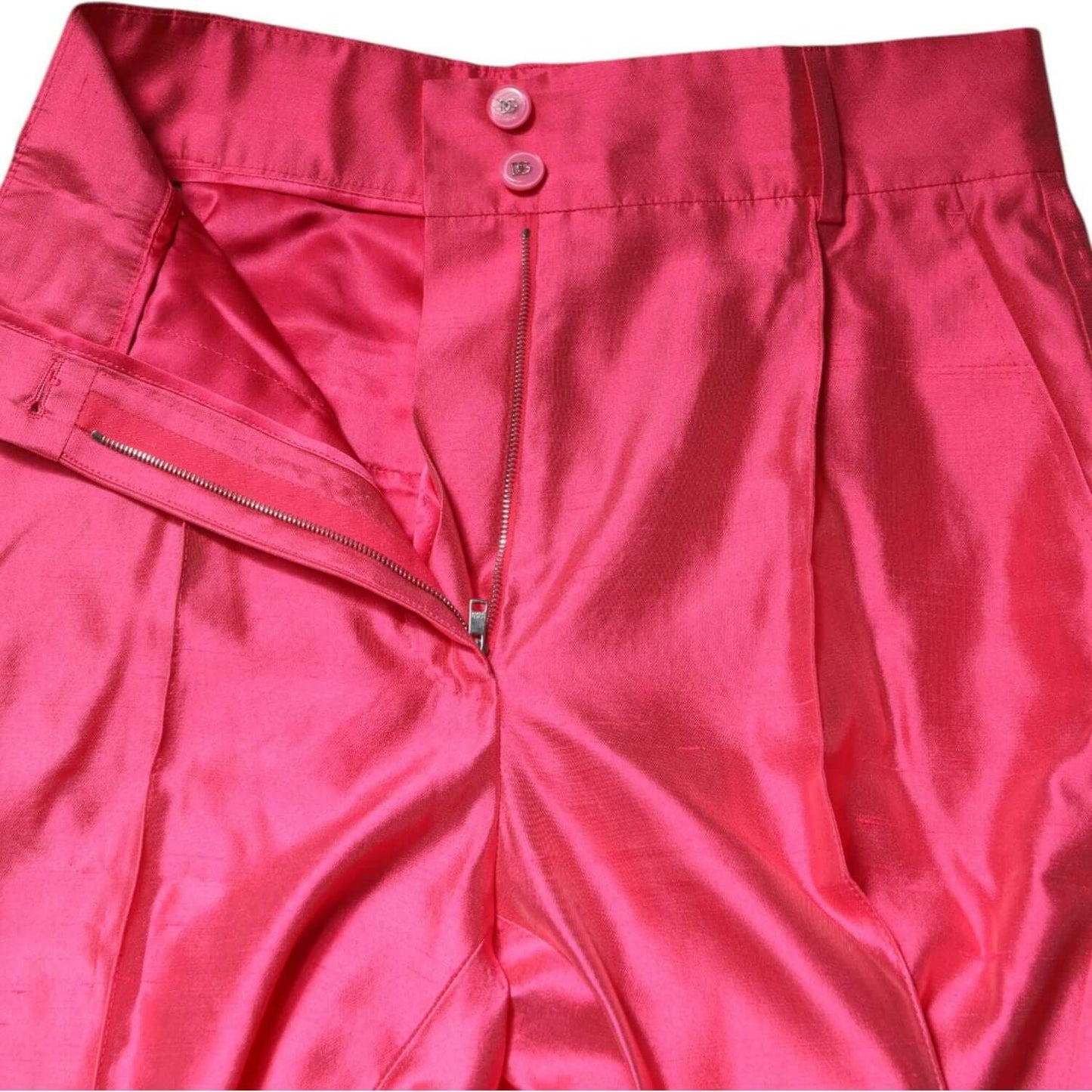 Dolce & Gabbana pink silk high waist tapered pants with zipper and button closure, luxury fashion made in Italy.