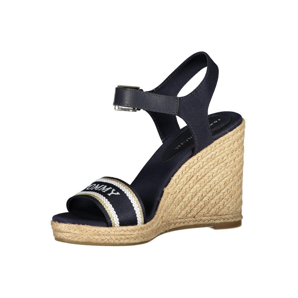 Tommy Hilfiger blue polyester sandal with 11 cm wedge heel, ankle buckle, contrast embroidery, and logo detailing.