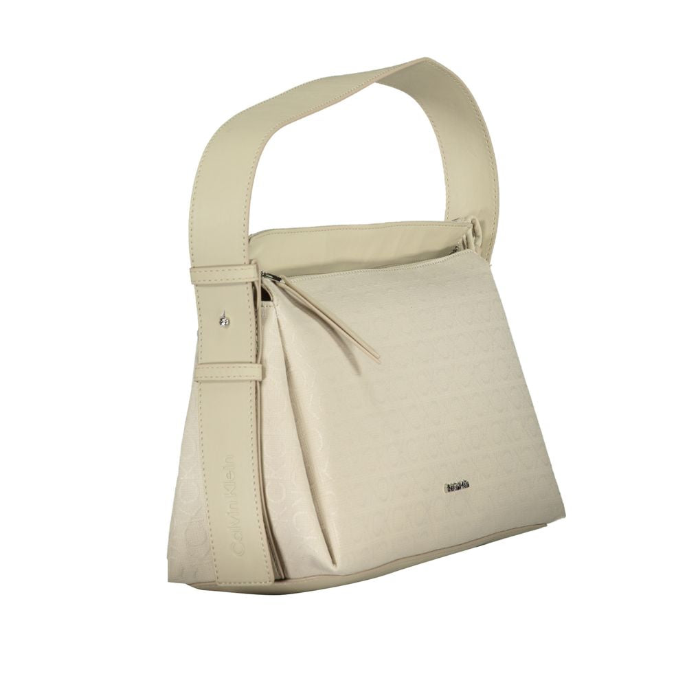 Calvin Klein Beige Polyester Handbag with adjustable shoulder handle, internal document pocket, contrasting details, and zip closure.