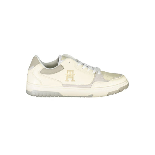 Tommy Hilfiger Beige Sports Sneakers with Unique Embroidery showing side view of sleek design and logo detail.