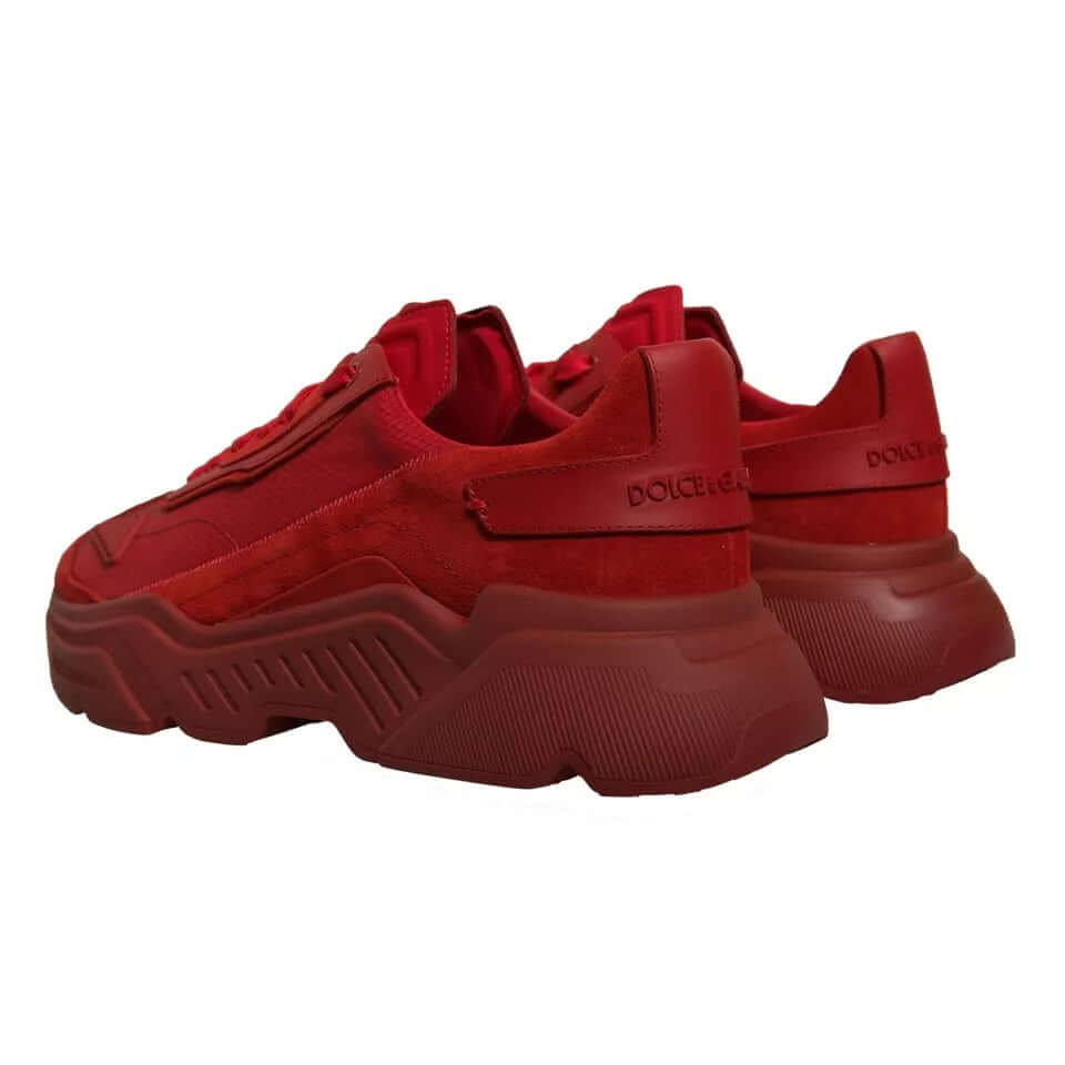 Dolce & Gabbana Daymaster red leather low top sneakers with rubber sole, showcasing logo details and high craftsmanship.