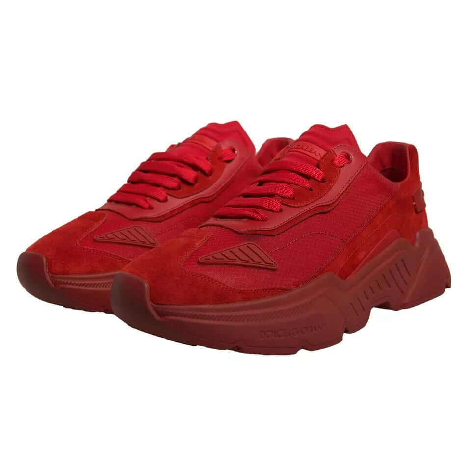 Dolce & Gabbana Daymaster red leather low top sneakers with rubber sole and logo detail, mismatched sizes, Italian craftsmanship.