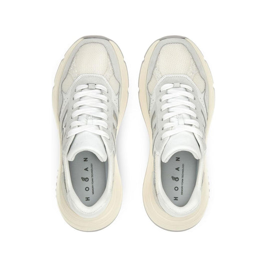 Top view of HOGAN PRE white sneakers featuring silver-tone leather, lace-up design, embossed logo, and rubber sole.
