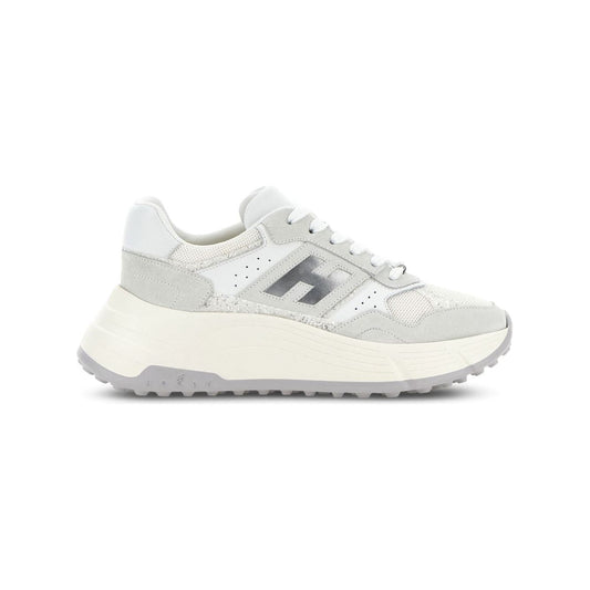 White and silver-tone Hogan Pre sneakers with lace-up front, padded ankle, perforated design, embossed logo, round toe, and rubber sole.