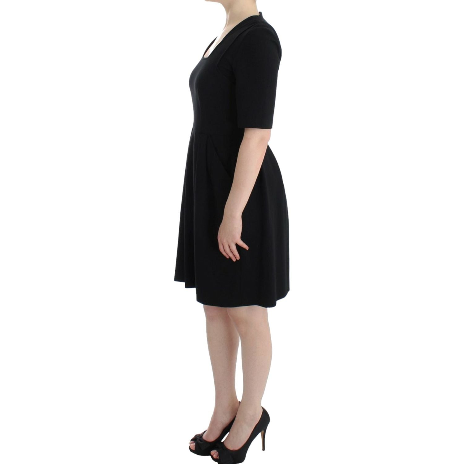 CO|TE Black short sleeve venus dress