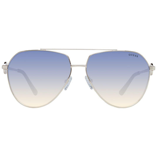 Gold metal frame aviator sunglasses for women with gradient blue lenses by Guess. Offers 100% UVA & UVB protection, full-rim design.