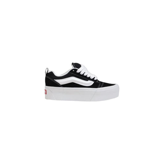 Vans black and white women's suede leather sneaker, part of the fall/winter collection.