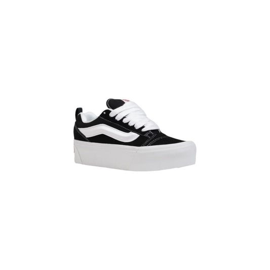 Vans women's black and white suede leather sneakers, Fall/Winter collection, stylish platform design with white laces.