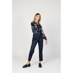 Woman wearing Street One Blue Viscose Pant with high waist and tapered fit, showcasing modern style and comfort.