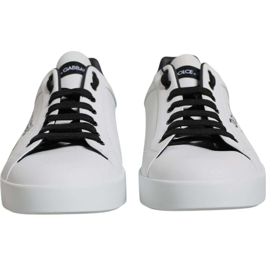 Dolce & Gabbana Portofino sneakers in white calf leather with black logo and lace-up closure, front view.
