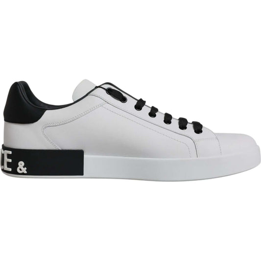 Dolce & Gabbana Portofino white leather sneakers with black logo, lace-up, rubber sole, and contrast heel detail, side view.