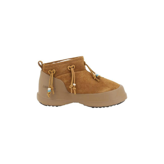 Brown suede Moon Boot Luna Low Ankle Boots with shearling lining and beaded lace details.