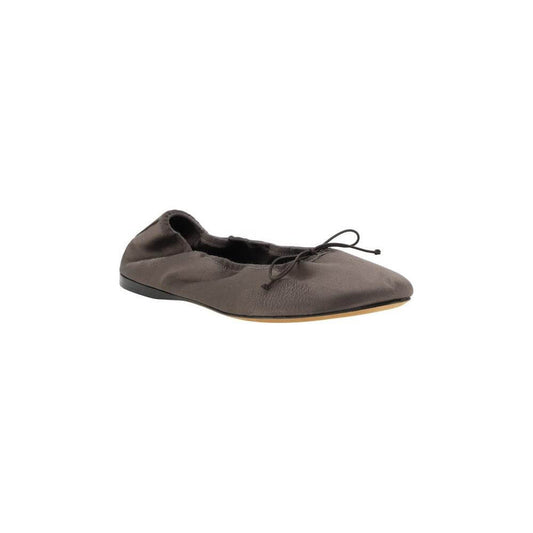 The Row Hereditas Ballerinas in satin with round toe, applique bow, and elasticized heel, featuring flat sole and branded insole.