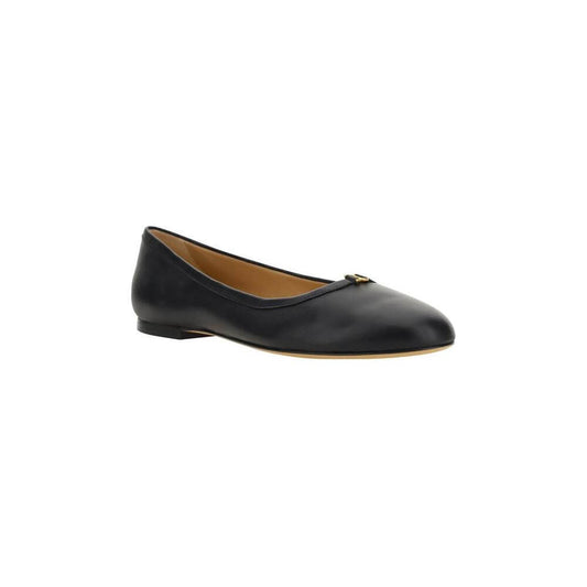 Chloé Marcie Ballerinas in black calfskin with round toe, flat leather sole, gold-tone front detail, and monochrome design.