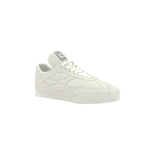 Chloé Kick Sneakers in white leather with lace-up closure, flat sole, and iconic logo patch, offering comfort and stylish elegance.