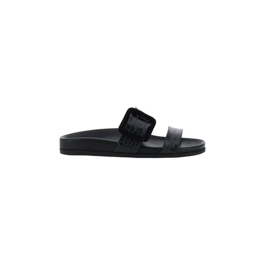 Manolo Blahnik Mayfu Sandals in black calfskin with croc-effect leather, double strap, rectangular embossed buckle, flat sole.