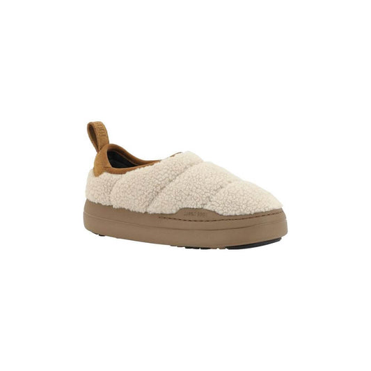 Moon Boot Park Puffer Shoes with shearling upper, non-slip sole, and pull-tab for easy fit. Quilted design with logoed insole.