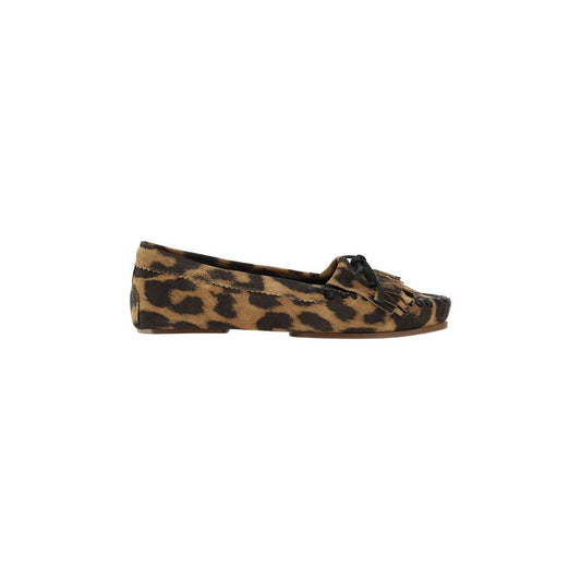 Paris Texas Indiana Loafers with leopard print, tassel detail, and bow. Flat sole for comfort in a chic moccasin style.