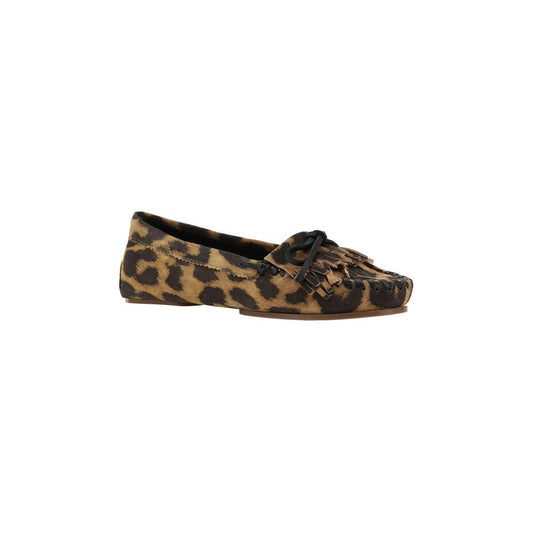 Paris Texas Leopard Print Indiana Loafers with tassel and bow detail, elegant moccasin-style stitching, and comfortable flat sole.