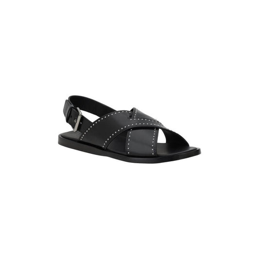 Church's black leather Oksana sandals with adjustable buckle and crisscross straps, featuring open toe and contrasting embellishments.