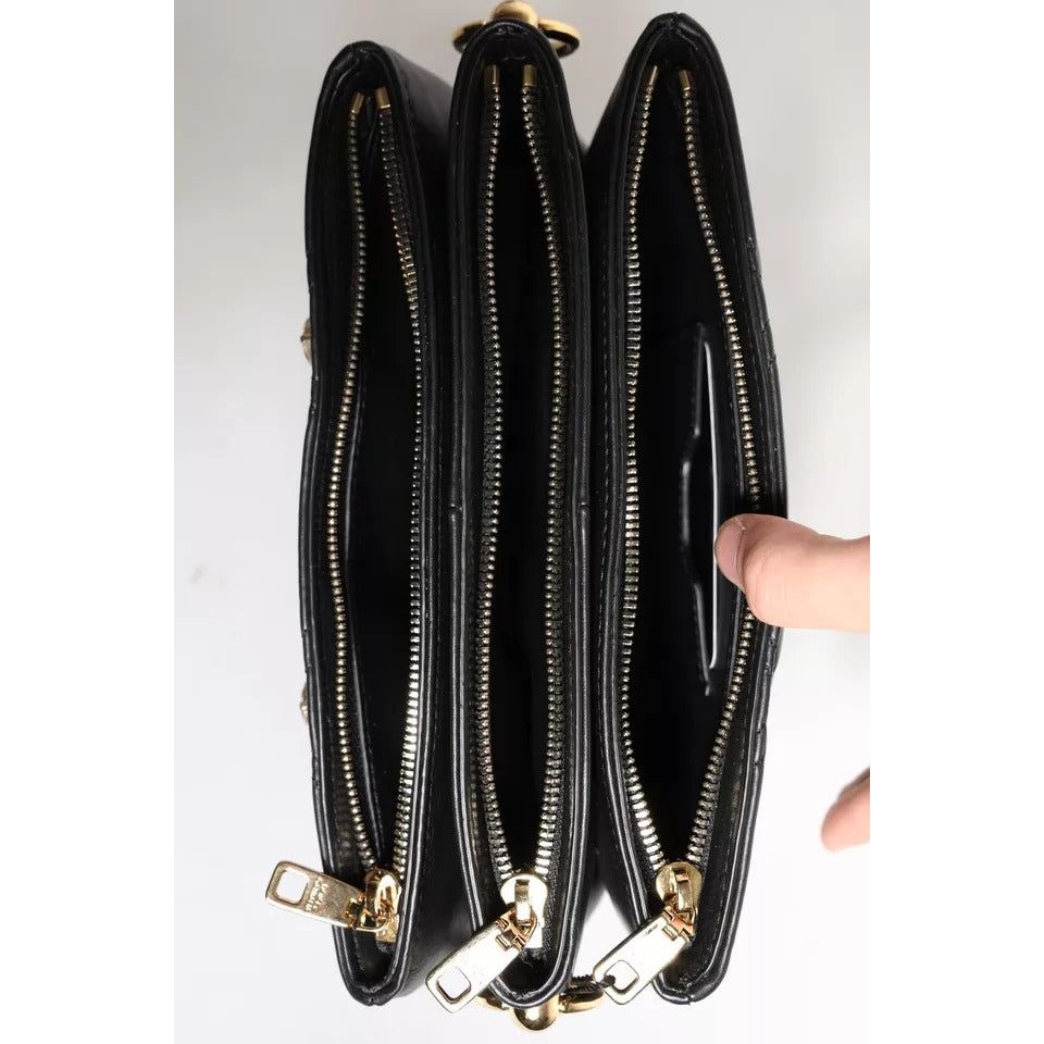 Front view with bag zipped and handles upright.