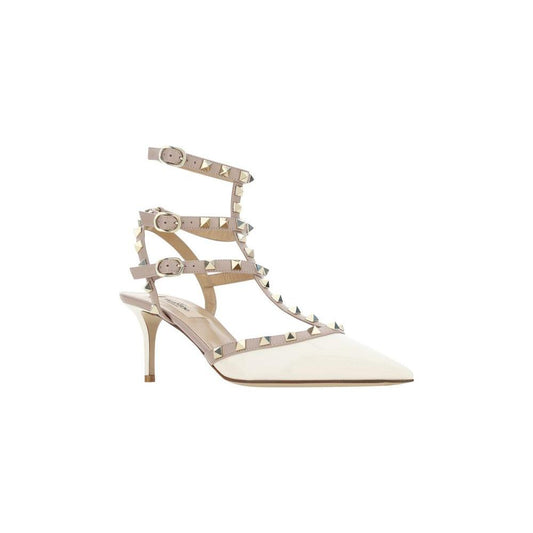 Valentino Garavani Rockstud Pumps in patent leather with studs and ankle strap, showcasing bold elegance and modern design.